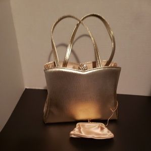 Gold "HL" small dressy handbag